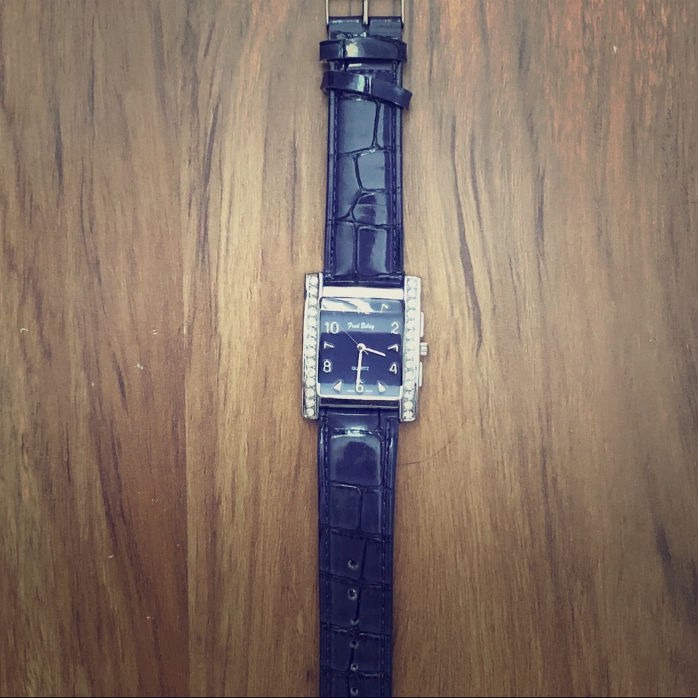 Fred Belay purple croc watch with rhinestones.